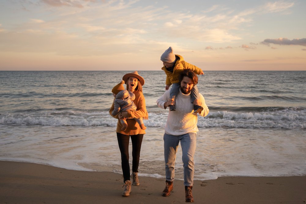 Family playing near the water