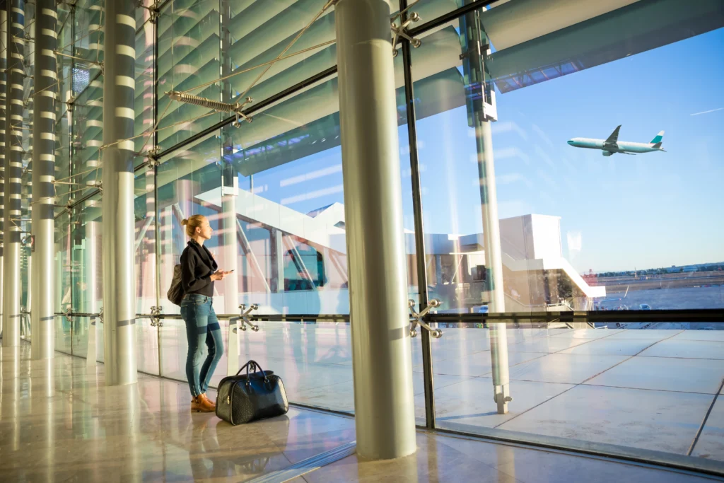 full-length-woman-standing-in an airport